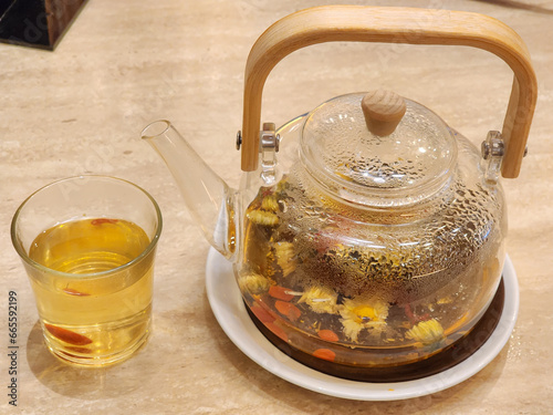 chrysanthemun tea in pot photo