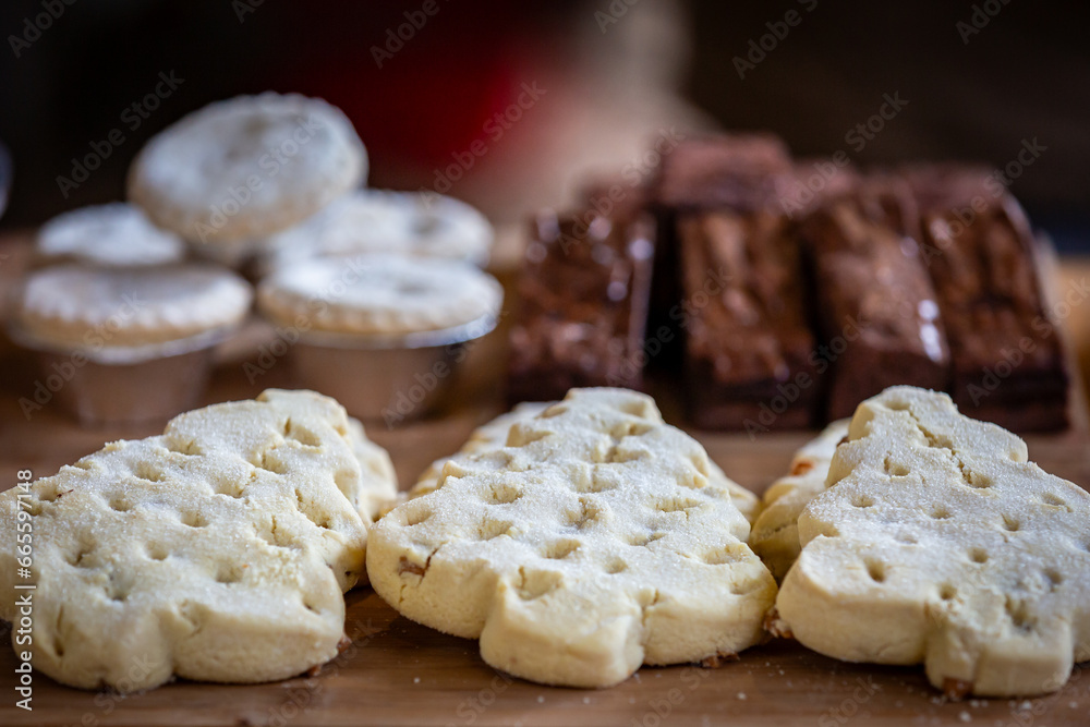 Festive treats displayed at a Christmas market, with a shallow depth of field