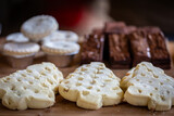 Festive treats displayed at a Christmas market, with a shallow depth of field