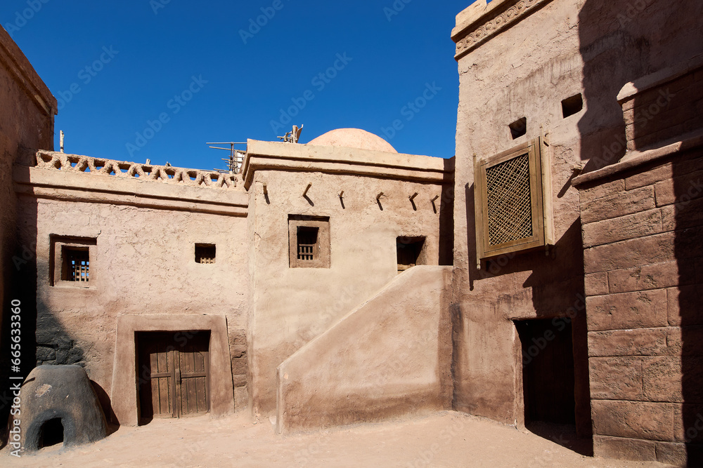 Traditional Moroccan architecture in a desert setting.