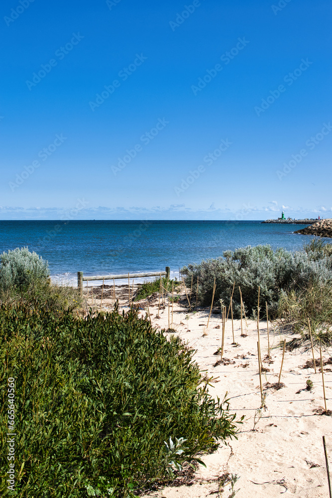 The sea and beach at Cottesloe Beach Western Australia. September 2022. Beautiful golden sand and beautiful blue skies and turquoise waters. 