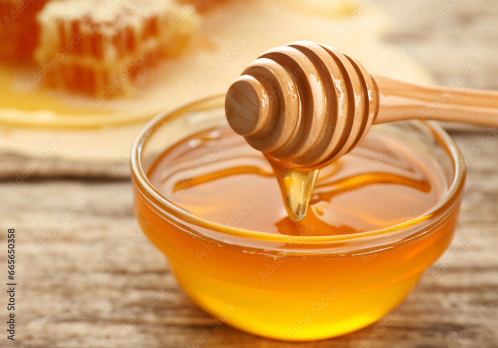 Honey dipper and honeycomb Honey dipper and honeycomb