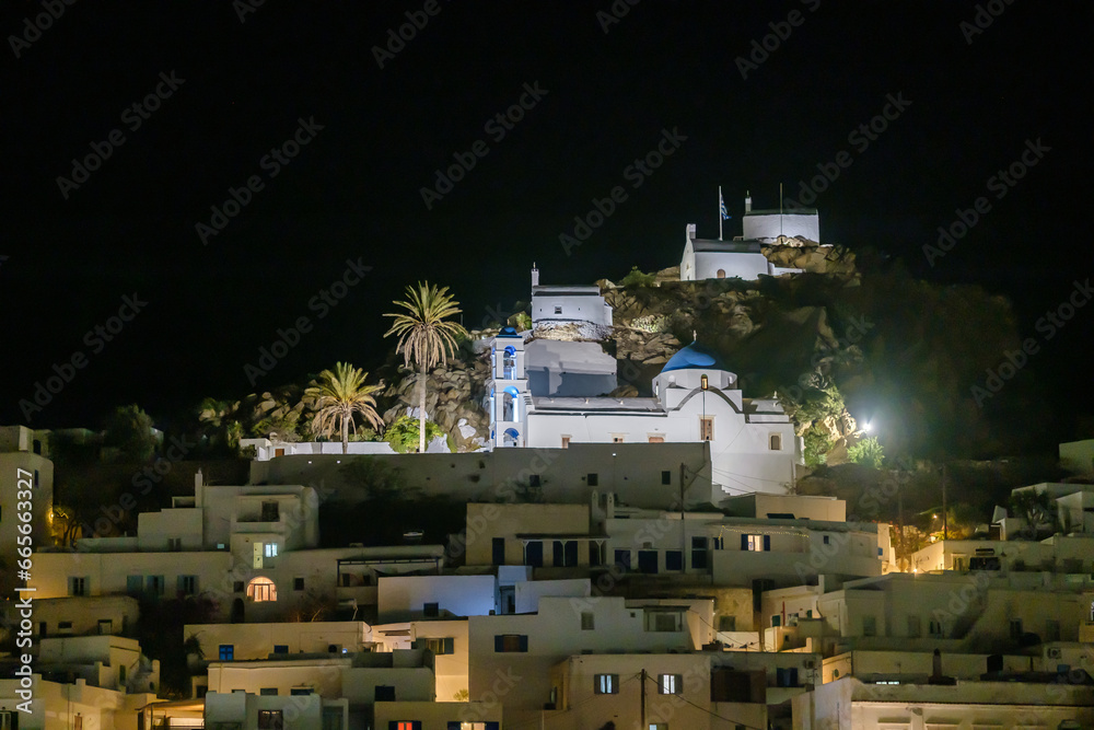 Panoramic view of the picturesque illuminated island of Ios in Greece at night