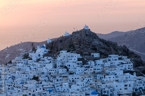 Panoramic view of the beautiful village also known as chora, in Ios Greece, while the sun is setting © DIMITRIOS