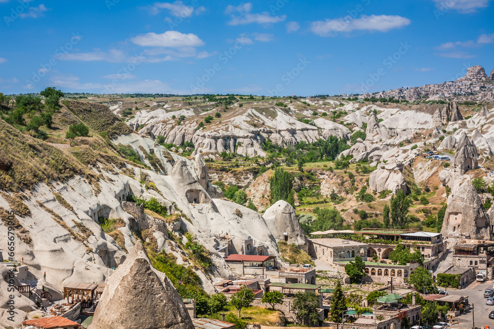 Fototapeta premium Rocky landscape in Cappadocia, Turkey. Travel in Cappadocia. Amazing landscape view of Uchisar town in Cappadocia Turkey