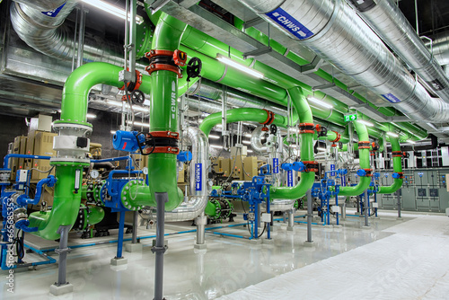 Industrial interior chiller and boiler HVAC heating ventilation air conditioning system and pipping line of industrial construction at boiler pump room system in the factory photo