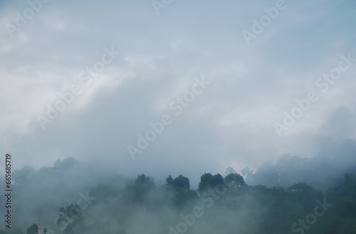 landscape of mountain with mist at Nang rong waterfall travel location in Thailand