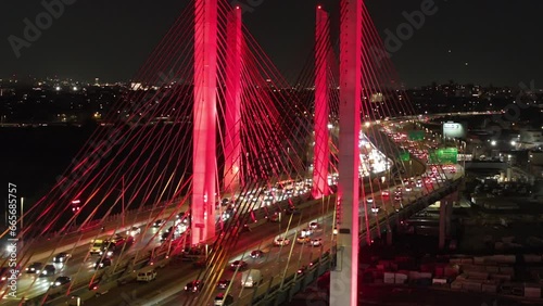 Aerial view of evening rush hour traffic passing over New York City's kosciuszko bridge photo