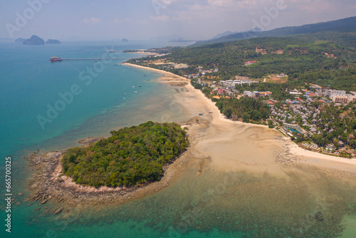 Aerial view blue sea and white long beach at Kwang beach Krabi..scenery white sand beach..Gradient blue sea background. .dramatic nature colorful seascape. photo