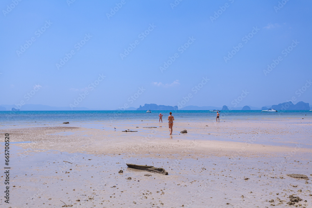 Aerial view blue sea and white long beach at Kwang beach Krabi..scenery white sand beach..Gradient blue sea background. .dramatic nature colorful seascape. Aerial view blue sea and white long beach at Kwang beach Krabi..scenery white sand beach..Gradient blue sea background. .dramatic nature colorful seascape.