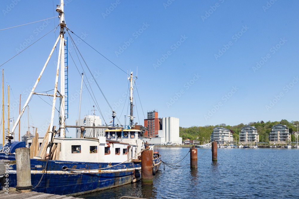 Along the street in Flensburg harbor with old boats, Flensburg, Germany
