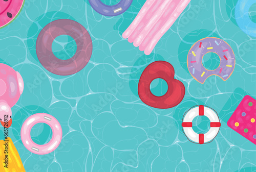 Inflatable rings and mattresses in swimming pool, top view