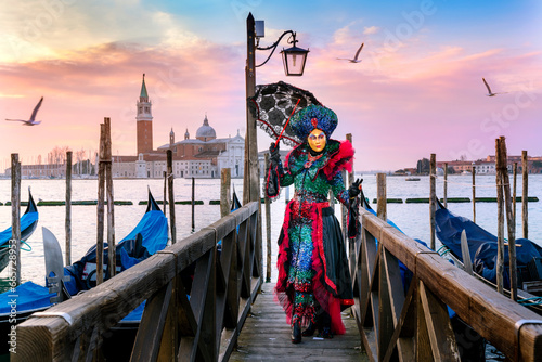 Carnevale di Venezia,Carneval .San Giorgio Maggiore in the background,.costumes,.Venice,Veneto,Italy,Europe,