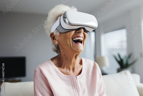 cheerful enjoy wonderful experience mature adult old senior woman wear vr vitual headset goggle while explore digital virtual world fun enjoy technology of visual in living room at home