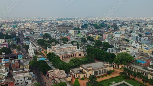 aerial view of Chowmahalla Palace in hyderabad, telangana with mecca masjid and charminar in the background push in drone shot photo