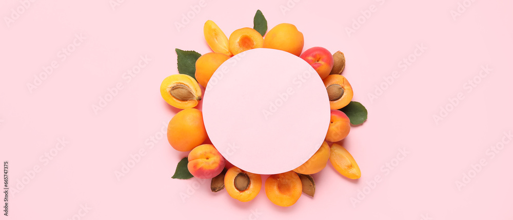 Blank card and sweet apricots on pink background, top view