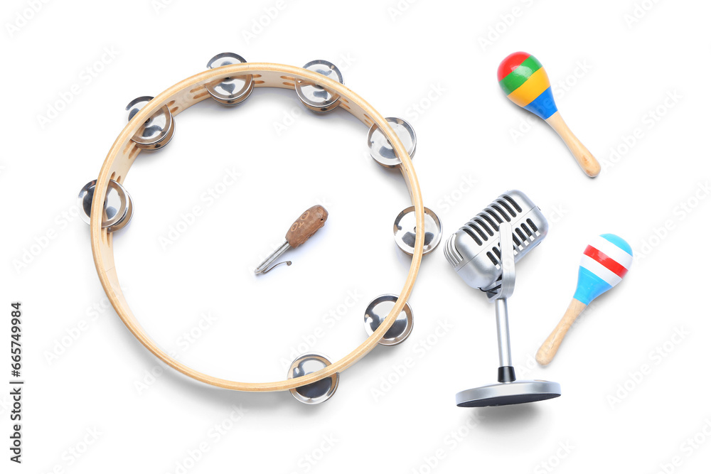 Fototapeta premium Different musical instruments and microphone on white background