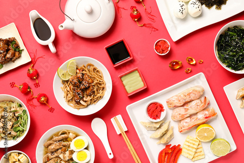 Composition with different Chinese food on red background © Pixel-Shot