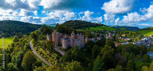 Aerial view of Dunster Castle in the village of Dunster, Somerset, England photo