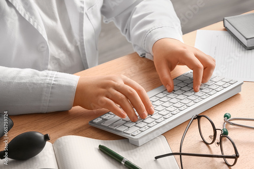 Medical professional typing...