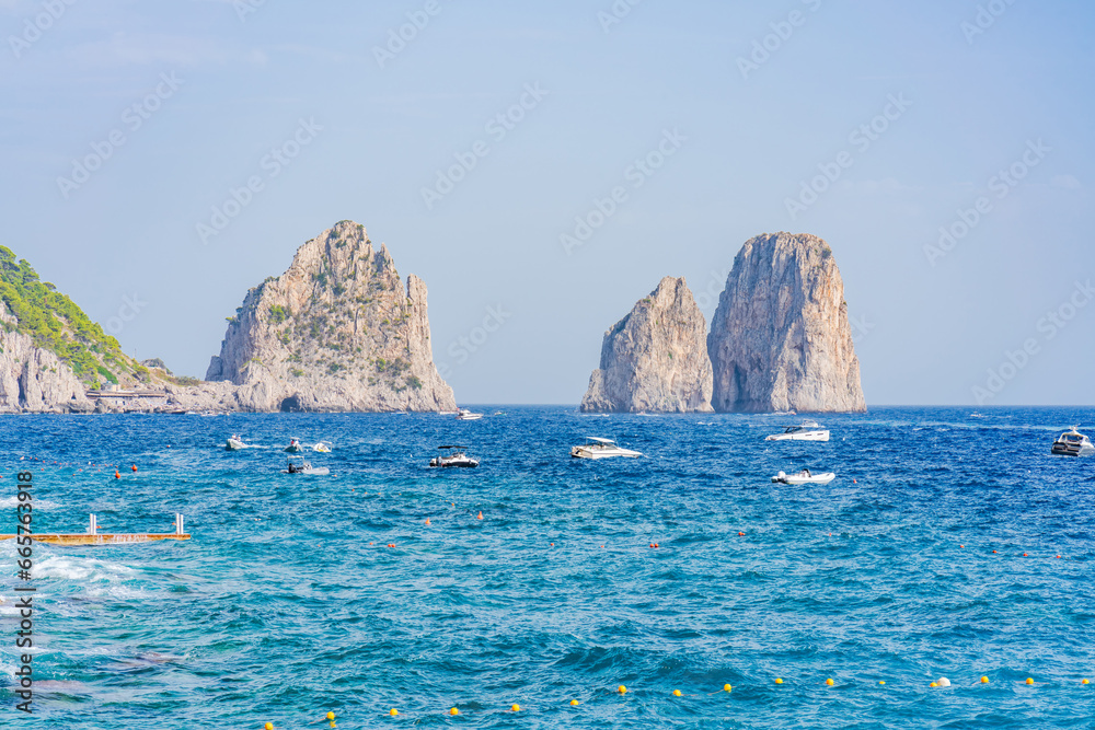View of Faraglioni Rocks and a Bay of Naples. Capri island, Italy