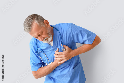 Mature doctor having heart ...