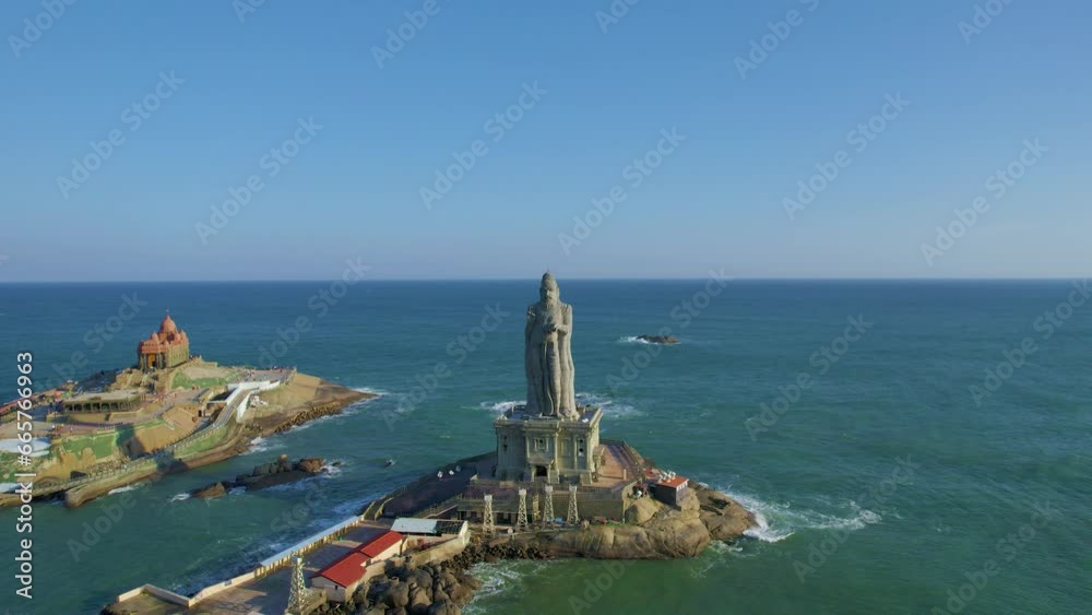 Thiruvalluvar Statue and Vivekananda Rock Memorial is a popular tourist monument in Kanyakumari, India. Aerial drone shot.