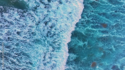 Beach, waves, rocks and coastal landscape in La Tablía in the area of the town of Suances. Aerial view from a drone. Suances Municipality. Cantabrian Sea. Cantabria. Spain. Europe photo