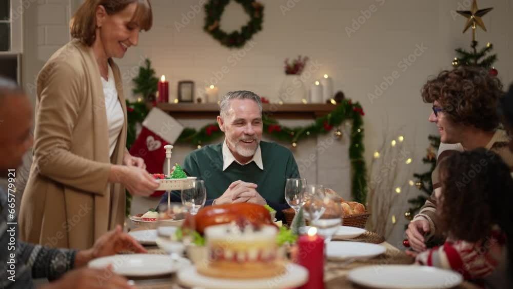 Happy family eating together at home, christmas party celebration, Celebrate the Thanksgiving holiday, New Year's Party. Happy family eating together at home, christmas party celebration, Celebrate the Thanksgiving holiday, New Year's Party.