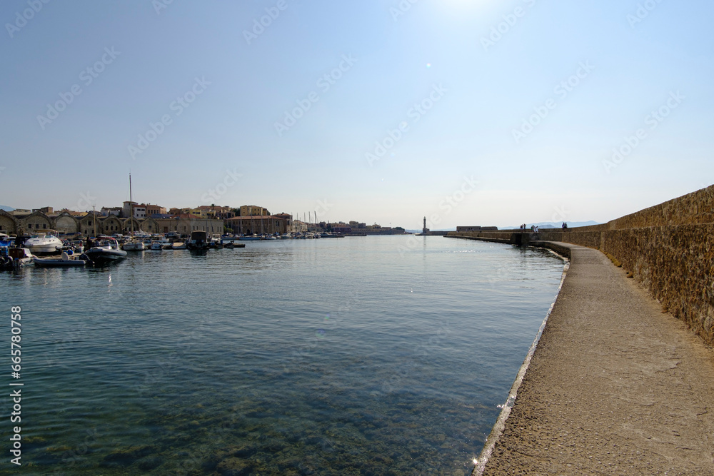Pier walk with quiet water dock in Chania, Crete, touristic Greek Island