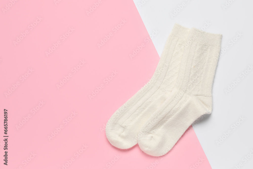 Warm socks on color background Warm socks on color background