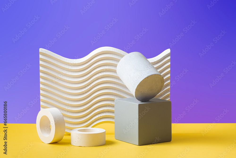 still life. Abstract three-dimensional compositions of geometric shapes on a purple gradient abstract background
