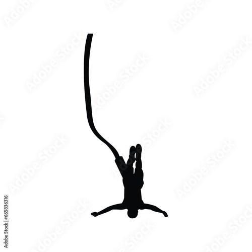 silhouette of a person bungee jumping