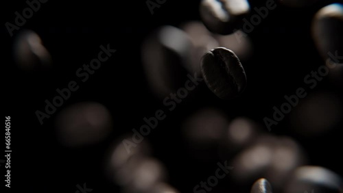 Close up of Coffee beans falling against a black background