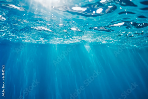 Beautiful natural light blue background with the texture, under the light blue water, in the deep blue water, under the surface
