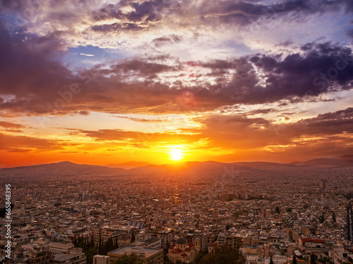 Fototapeta Naklejka Na Ścianę i Meble -  Sunset with dramatic sky over Athens city, Greece