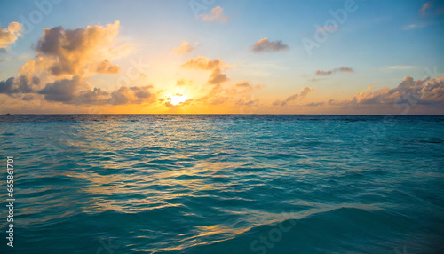 colorful sunset over ocean on maldives © Enzo
