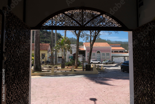 Paraibuna city square seen door frame - São Paulo, Brazil.