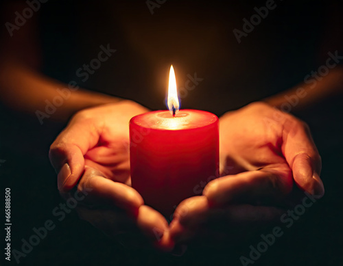 small candle burning held in hands on black background generative ai