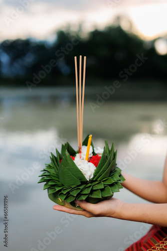 A young woman wearing an ancient Thai dress on the day of the Loi Krathong Festival