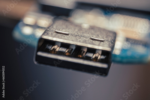 Computer universal USB 2.0 connector close up. Macro photography with low depth of field.