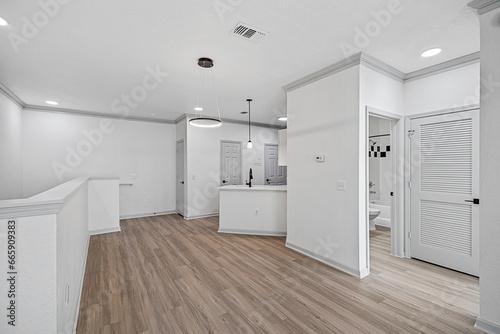 kitchen interior and wooden floor. Simply furniture with utensils  shelves with crockery and refrigerator in modern minimal design  empty space  wood floor