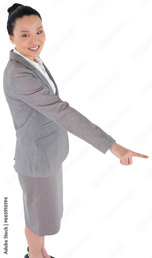 Digital png photo of happy asian businesswoman pointing on transparent background Digital png photo of happy asian businesswoman pointing on transparent background