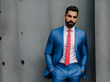 blue suit and red tie