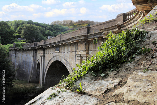 The Dundas Aqueduct carries the Kenneth and Avon Canal over the river Avon at Monkton Combe, Wiltshire, England. photo