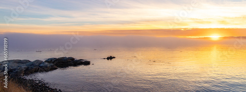 Rocky Shore on the Pacific Ocean Coast. Foggy Sunset. Victoria  Vancouver Island  BC  Canada.