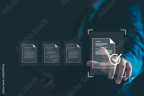 Electronic document management concept. Document management man sign an electronic approve, online document, paperless workplace, digital electronic approve business quality agreement. Virtual screen
