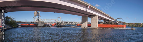 Dismantling of old tram bridge Lidingöbron, prams and cranes, a sunny autumn day in Stockholm