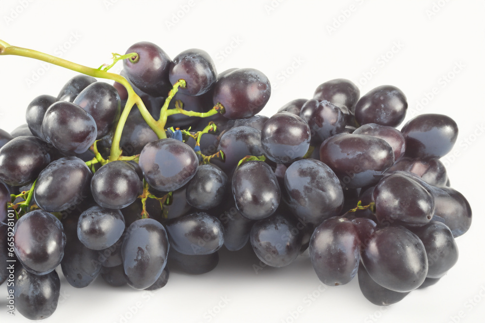 Blue wet Isabella grapes bunch isolated on white background as package design element Blue wet Isabella grapes bunch isolated on white background as package design element