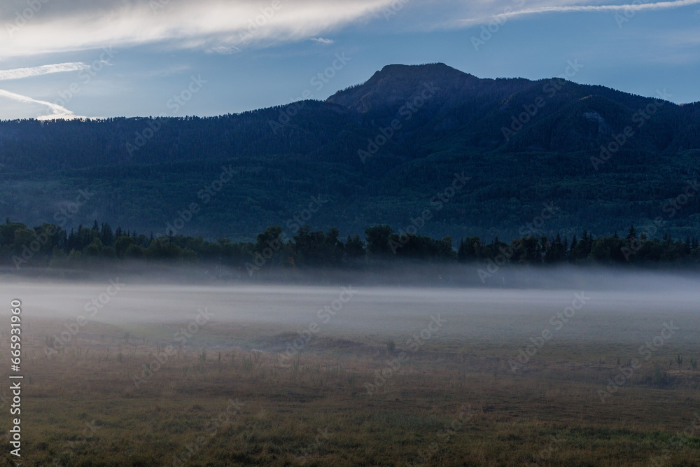 Morning fog seen at sunrise in Colorado's San Juan Range.
